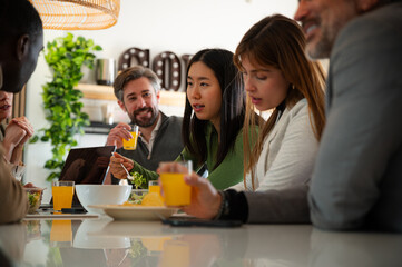 Group of colleagues enjoying a casual lunch break together