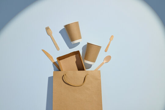 =eco-friendly utensils, cups, and bag, emphasizing sustainable
