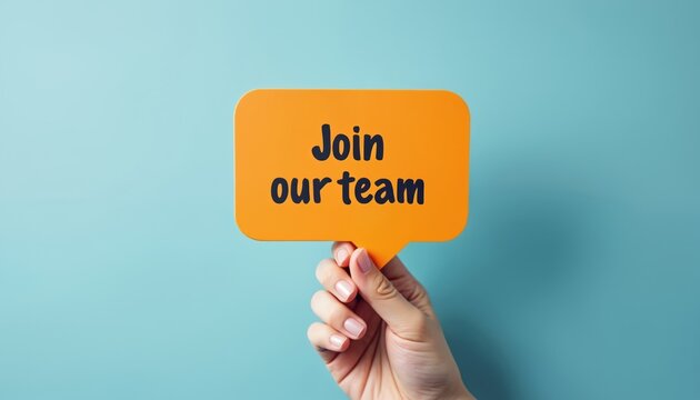 Hand holding yellow speech bubble with text Join team against blue background. Recruitment hiring employment concept. Seeking job position work offers. Human resources, career opportunity, job search.