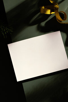 Stationery Flat LayMock-Up with Moody Dark Green Paper Background