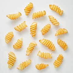 A close-up image of sliced pasta arranged neatly on a clean white background ready for culinary use in dishes