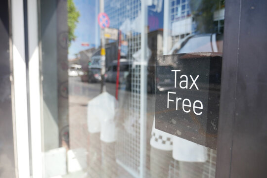 Shop offers tax-free shopping in a busy urban area during the day