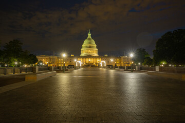 Fototapeta premium The Capitol. Independence Day in USA. Capitol is freedom and justice in America. The dome of the Capitol in Washington DC. The United States flag on the Capitol building. American history.