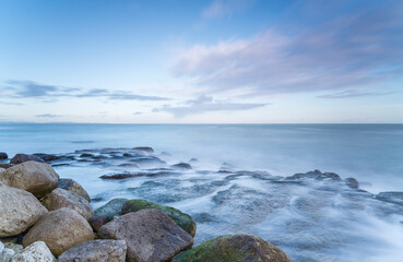 Sea washing over rocks on the coast.