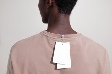 Blank Clothing Tag Mockup on Sweatshirt
