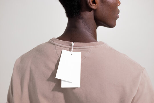 White Apparel Tags Hanging on Back
