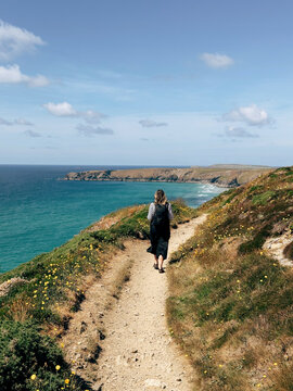 Person walking along coastal path