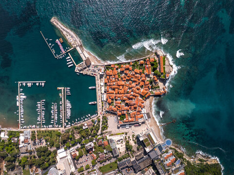 Budva Old Town and sea marina, overhead shot