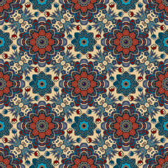 Beautiful floral fairytale pattern in folk style. Seamless print for fabric. Blue and red big and small flowers on ivory background.
