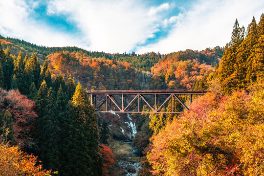 Fukushima, JAPAN - Nov 10, 2024: Tadami line railroad bridge across Tadami river near Takuya station in Fukushima