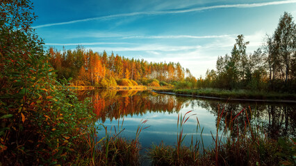 Lake on an autumn evening. Autumn landscape. Background for relax.