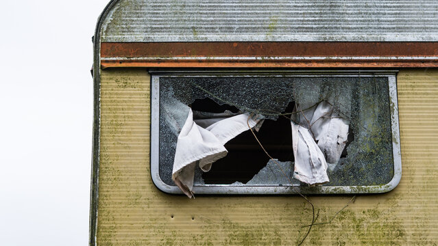 A broken window in a caravan.