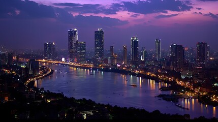A breathtaking panoramic night view of Hyderabad, showcasing its modern skyline and historic landmarks glowing in city lights.