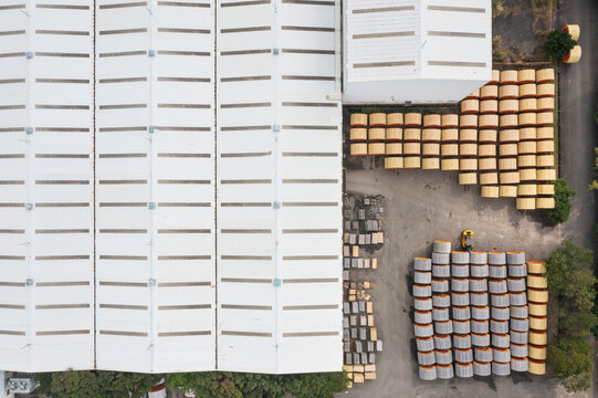 Aerial View of Cable Factory with Cable Reels and Buildings