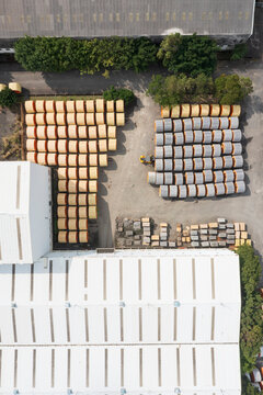 Aerial View of Cable Factory with Cable Reels and Buildings