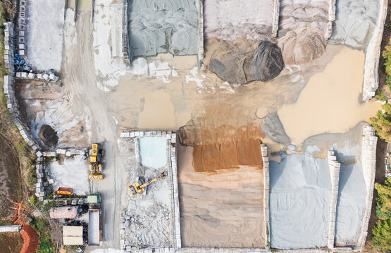 Aerial View Cement Plant Storage Bays and Heavy Equipment
