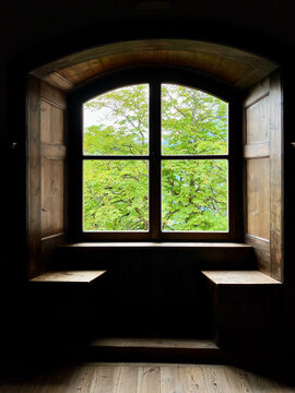 Wooden bench inside ancient castle in italy