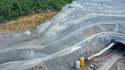 Aerial View of a Tunnel Construction Site Surrounded by Greenery