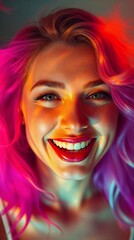 Vibrant portrait of smiling woman with colorful neon lighting and pink purple hair
