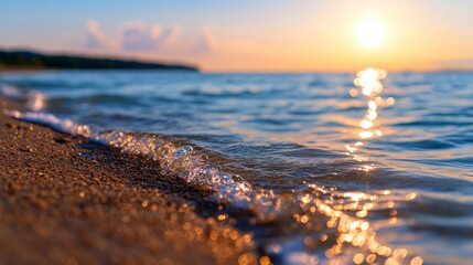 Obraz premium Golden Sunrise Over Tranquil Ocean Waves Gently Lapping on Sandy Shoreline at Peaceful Beach Setting