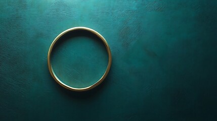 A golden ring sits against a teal textured backdrop