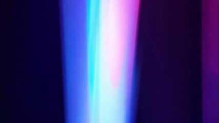 Bright neon lights create an energetic atmosphere during an evening event at a local venue