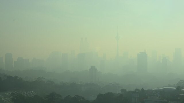 Kuala Lumpur foggy morning sunrise