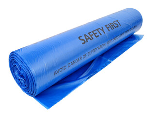 Roll of blue plastic bin bags with warning text printed on each bag isolated on a white background
