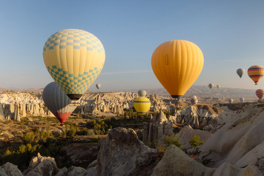 landscape hot air balloons in the sky over Cappadocia