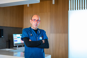 Veterinarian posing with arms crossed in modern clinic