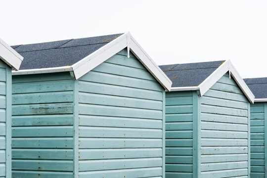Painted beach huts in a row