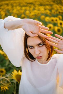 A bright portrait of a girl in a field