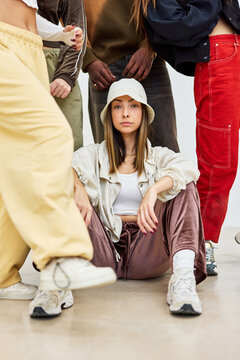 Group of young adults in casual streetwear showcasing urban styl