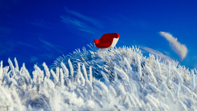 Red armchair emerges in a snowy landscape under a dramatic sky