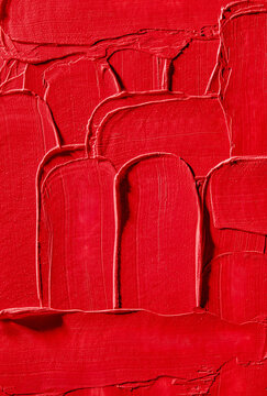Abstract texture of bright red lipstick layered in strokes