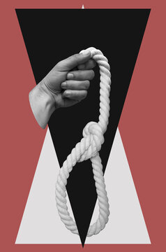 Hand holding rope noose