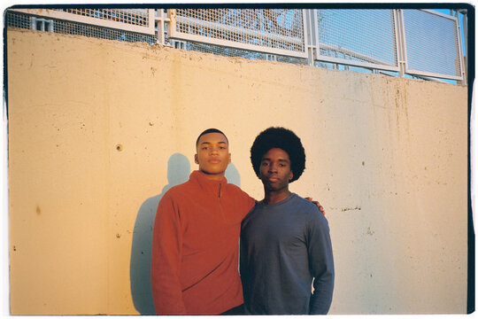 Mid-range analog portrait of a gay couple enjoying time together