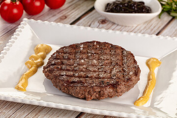 Grilled juicy beef cutlet for burger