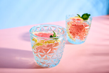 Chilled cocktail with grapefruit and fresh mint leaves. Summer refreshing drinks