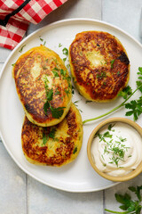 Potato patties stuffed with meat and sour cream.top veiw