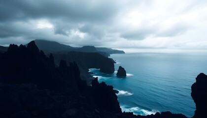 Dramatic Coastal Cliffs Silhouette at Ocean Bay Under Cloudy Sky