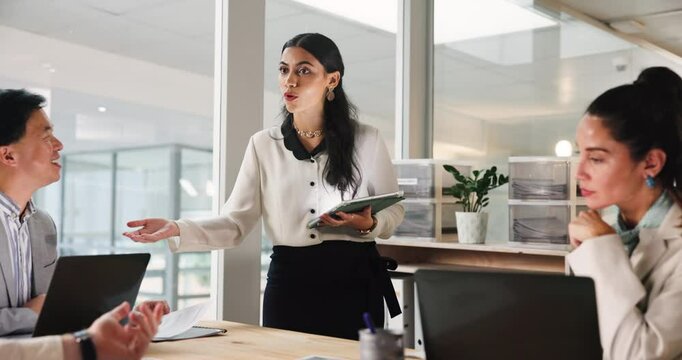 Business woman, tablet and presentation with group for insurance, finance and risk management. Technology, speaker and discussion of ideas in meeting, training and brainstorming policy in office
