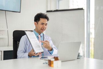 Fototapeta premium Remote Consultation and Patient Care. A healthcare provider engaged in online consultation, presenting a medical document to the patient.