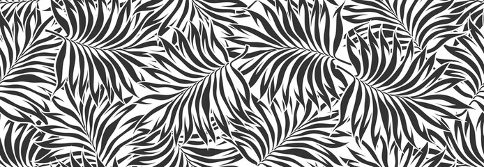 Abstract floral palm leaves seamless pattern. black floral leaves geometric pattern on white background. leaves silhouette summer pattern. © andin
