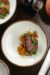 beefsteak with vegetables and sauces