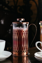 berry juice in a teapot in a restaurant