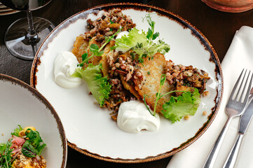 potato pancakes with mushrooms and onions