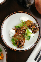 potato pancakes with mushrooms and onions
