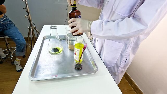 Colorful Chemical Reaction Experiment with Beaker and Tube