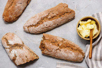 Gluten Free Buckwheat Rye Baguette Sliced and Buttered